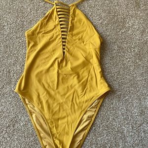 Forever 21 one piece suit.